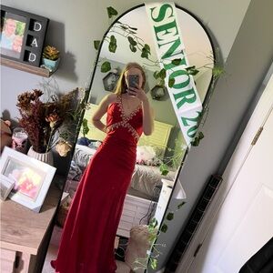 Elegant Red Gown with Embellished Details